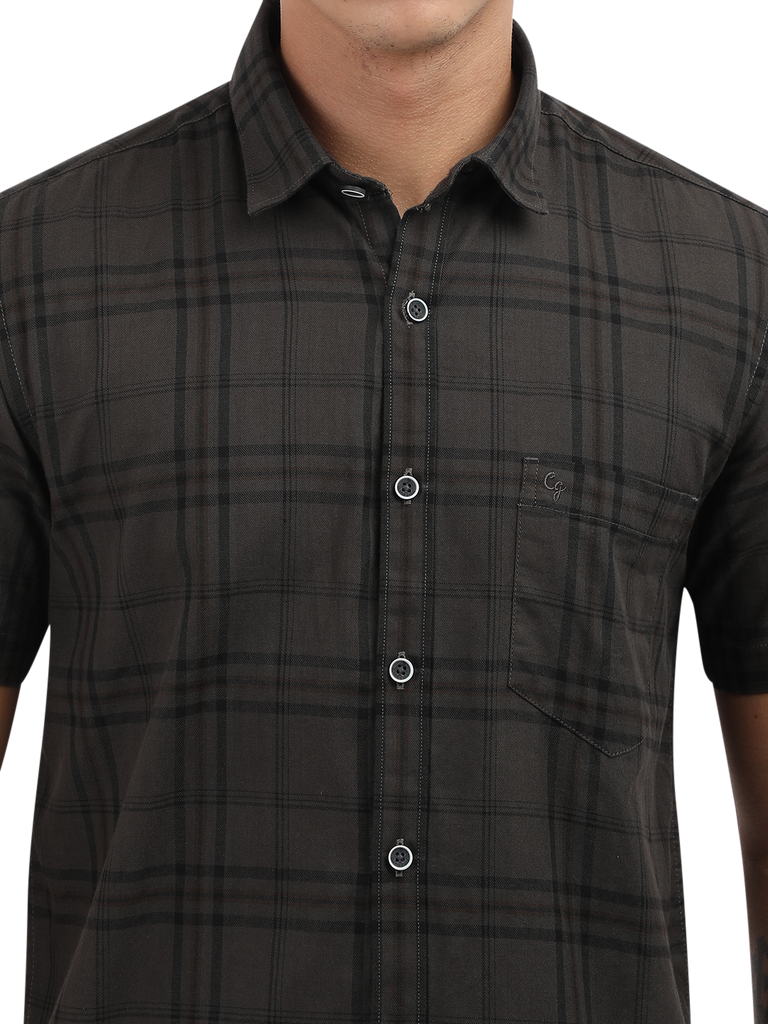 Model wearing Clarke Gable's Grey Checked Semi Casual Shirt in a casual setting