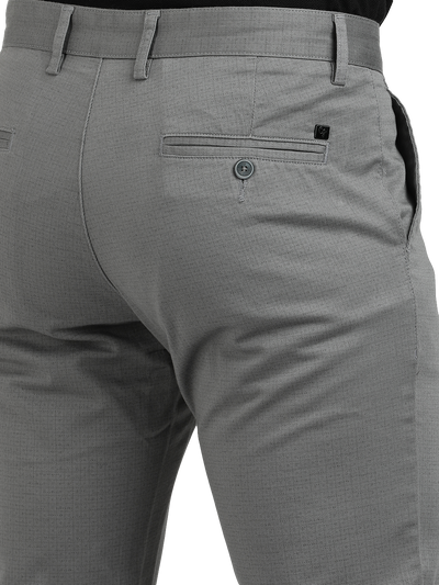 Model wearing Clarke Gable's Grey Custom Fit Trousers in a casual setting