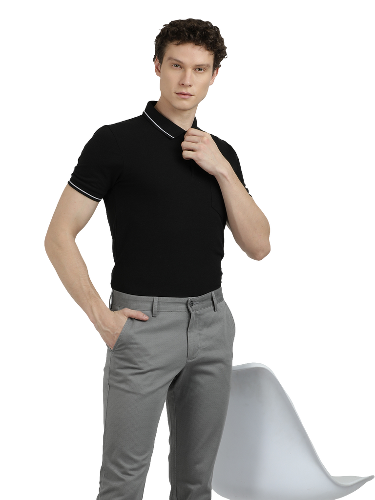 Model wearing Clarke Gable's Grey Custom Fit Trousers in a casual setting