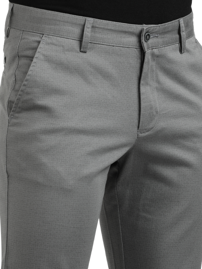 Model wearing Clarke Gable's Grey Custom Fit Trousers in a casual setting