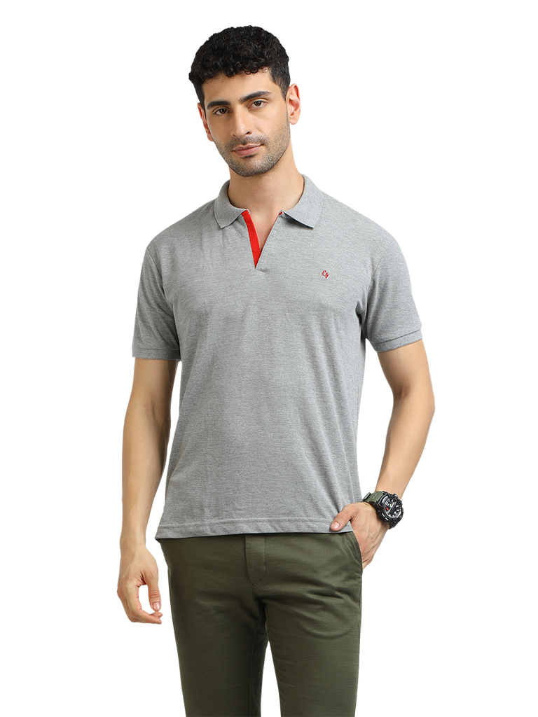 Model wearing Clarke Gable's Grey Melange Solid Polo Collar T-Shirt in a casual setting