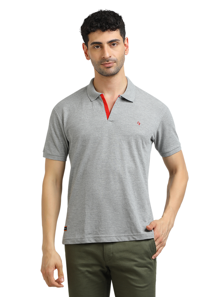 Model wearing Clarke Gable's Grey Melange Solid Polo Collar T-Shirt in a casual setting