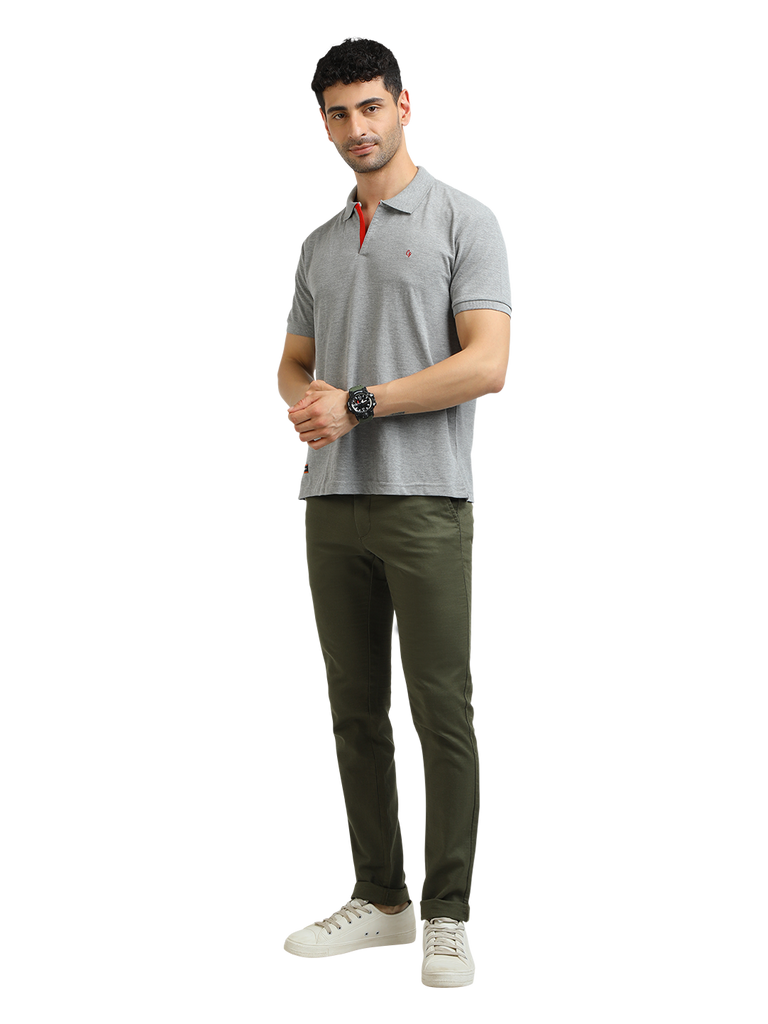 Model wearing Clarke Gable's Grey Melange Solid Polo Collar T-Shirt in a casual setting