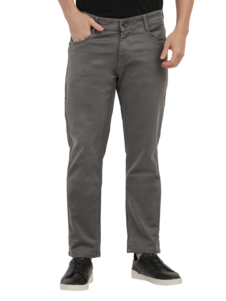 Model wearing Clarke Gable's Grey Skinny Fit Jeans in a casual setting