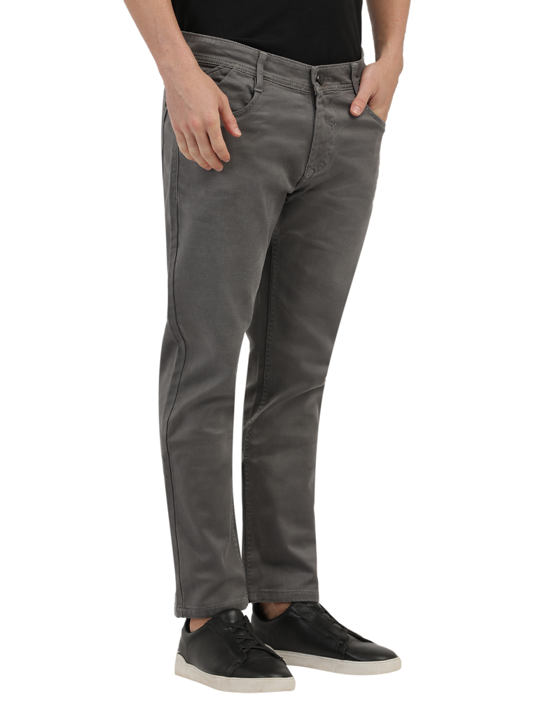 Model wearing Clarke Gable's Grey Skinny Fit Jeans in a casual setting