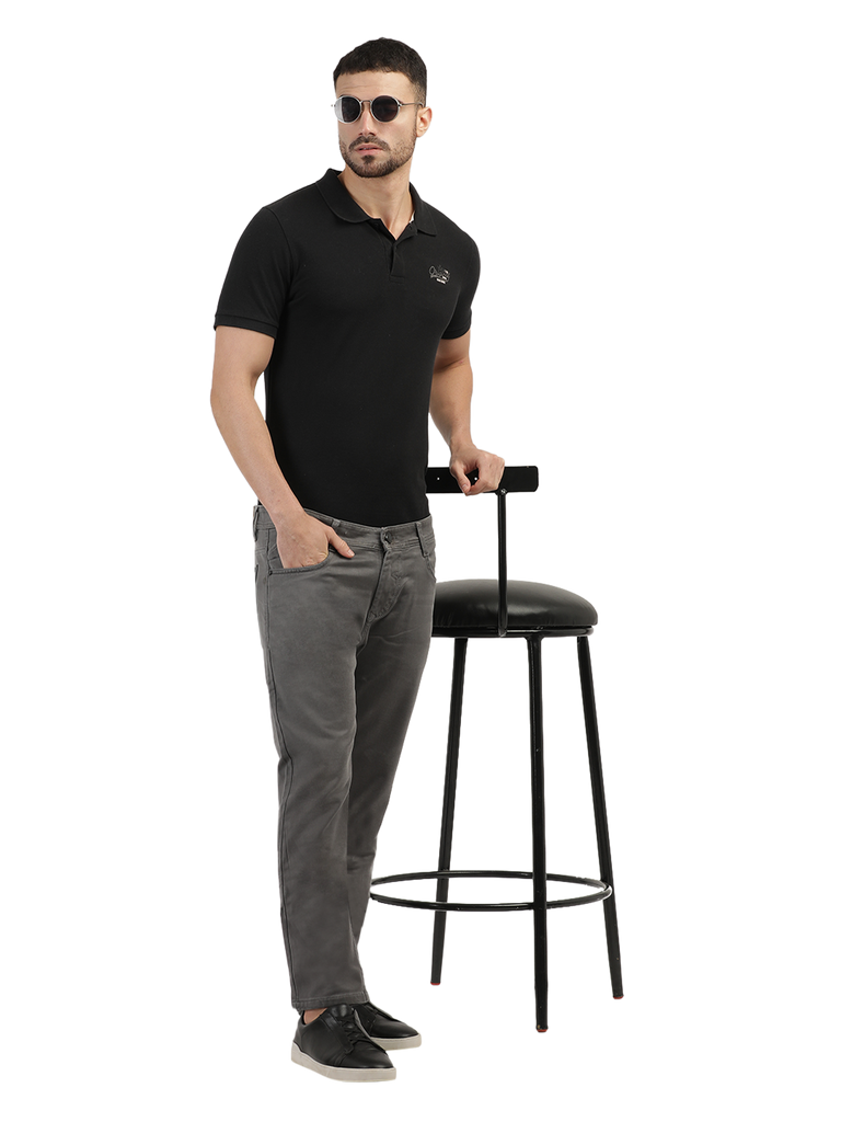 Model wearing Clarke Gable's Grey Skinny Fit Jeans in a casual setting