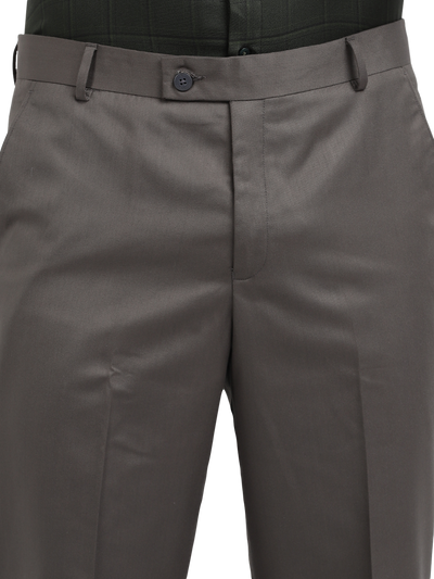 Model wearing Clarke Gable's Grey Smart Fit Trousers in a casual setting