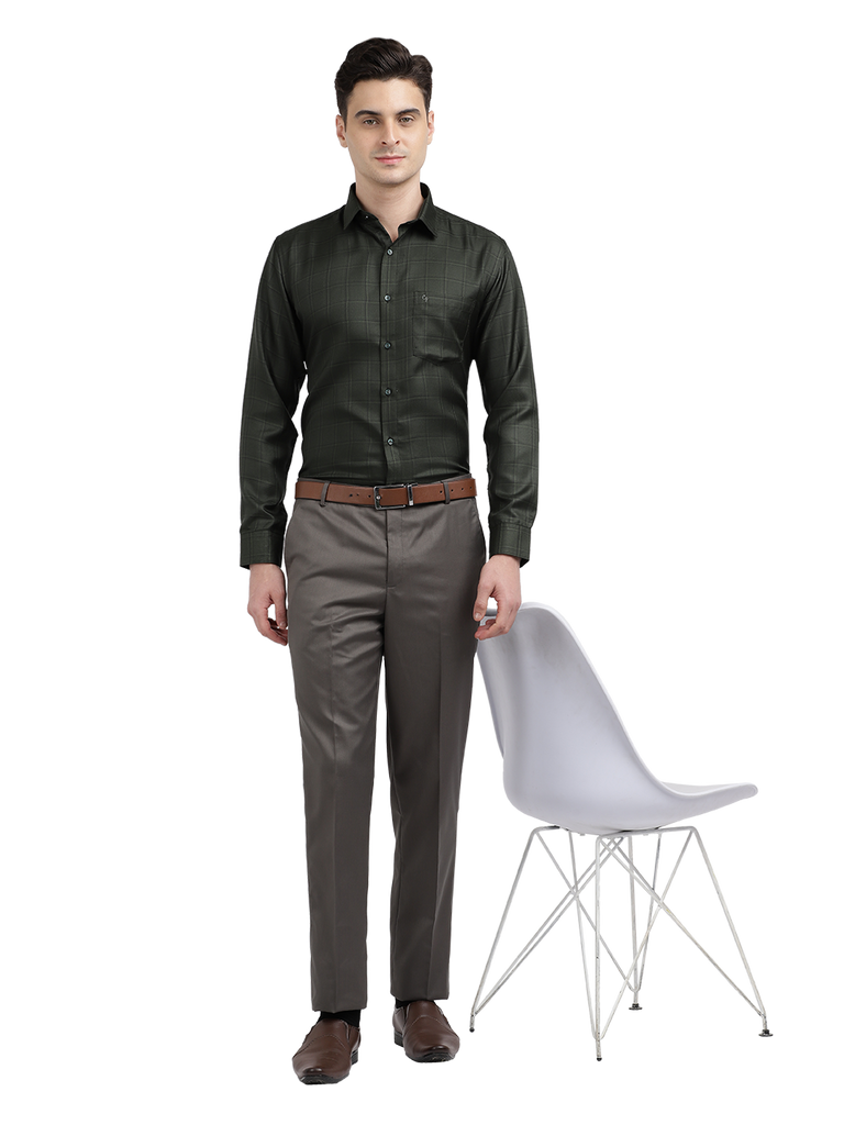 Model wearing Clarke Gable's Grey Smart Fit Trousers in a casual setting