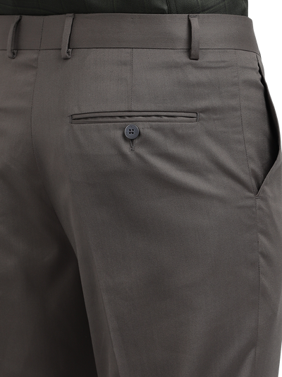 Model wearing Clarke Gable's Grey Smart Fit Trousers in a casual setting