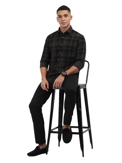 Model wearing Clarke Gable's Grey With Black Checked Semi Casual Shirt in a casual setting