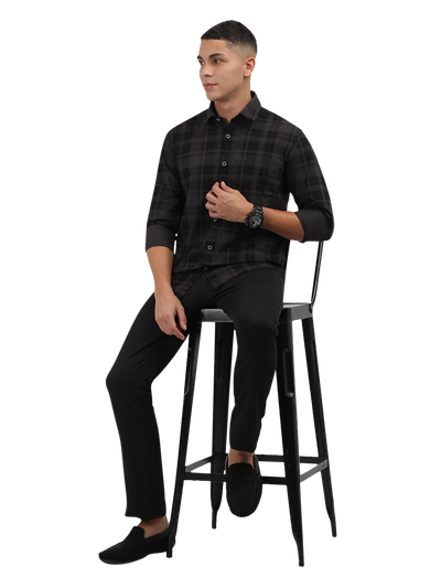 Model wearing Clarke Gable's Grey With Black Checked Semi Casual Shirt in a casual setting