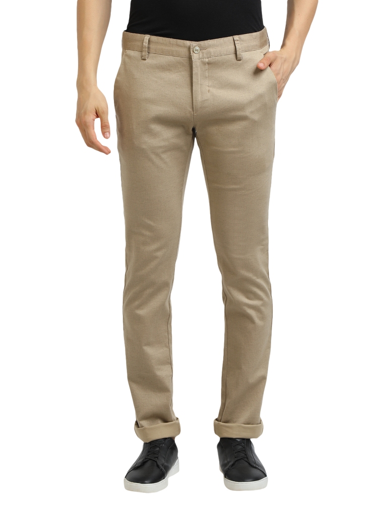 Model wearing Clarke Gable's Khaki Trim Fit Trousers in a casual setting