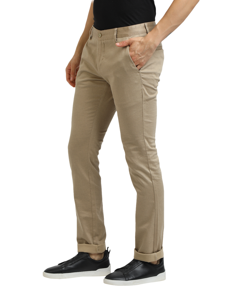 Model wearing Clarke Gable's Khaki Trim Fit Trousers in a casual setting