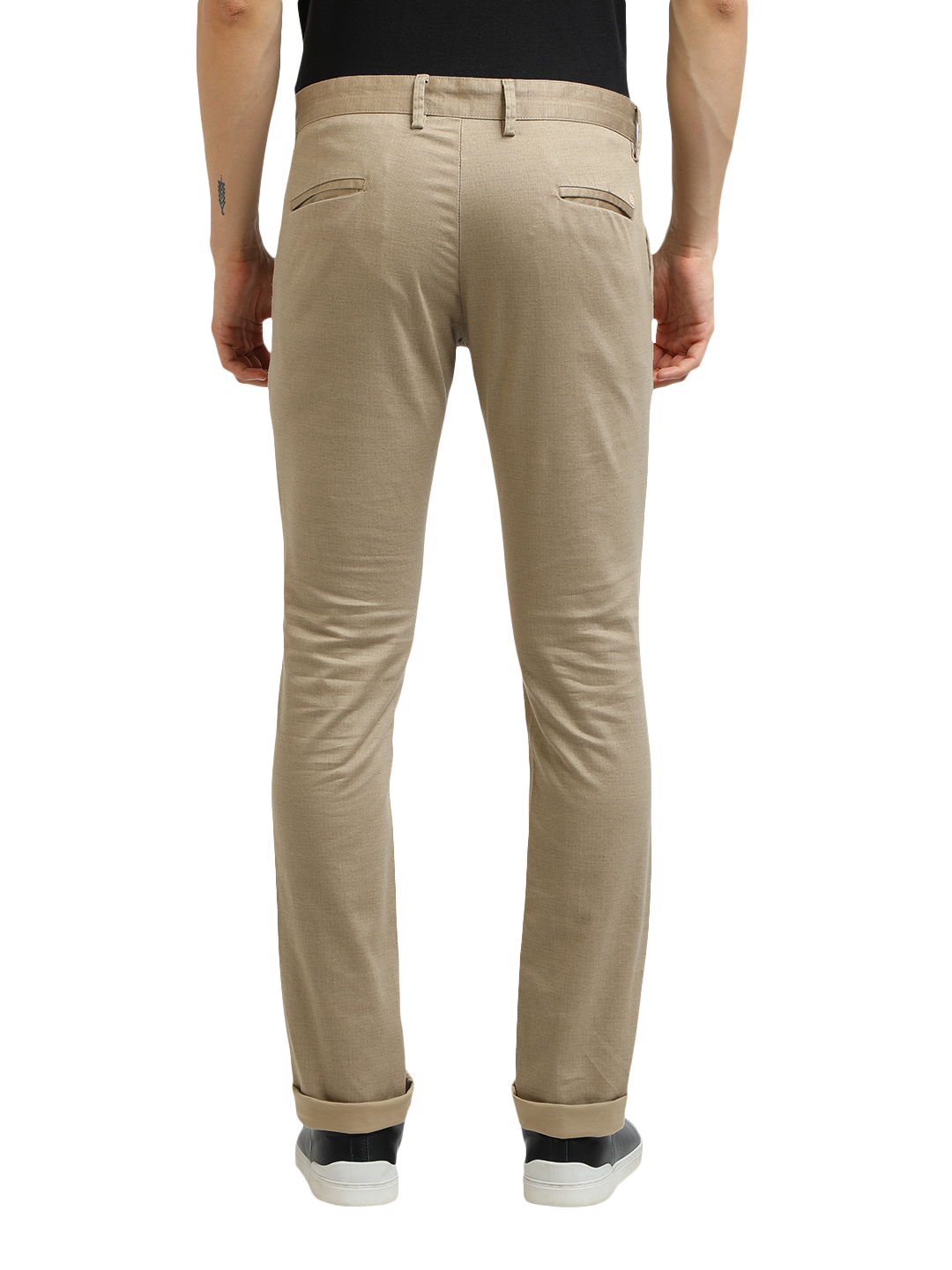 Model wearing Clarke Gable's Khaki Trim Fit Trousers in a casual setting