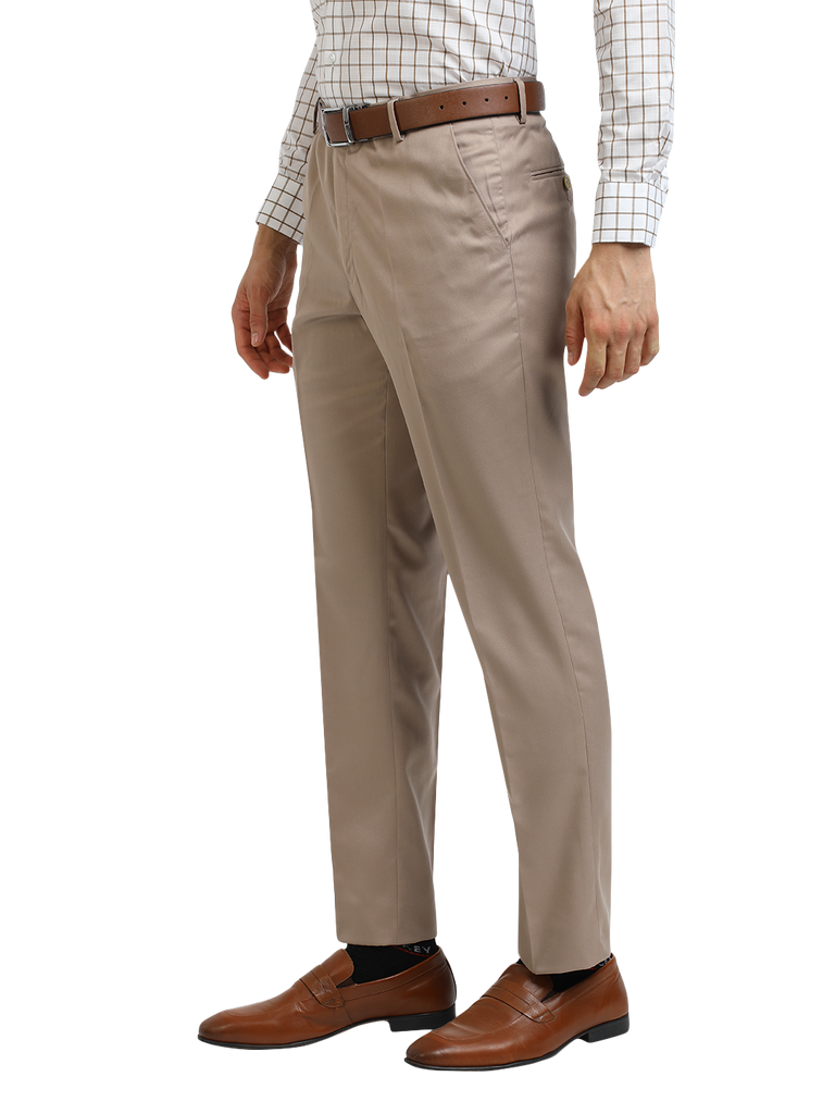 Model wearing Clarke Gable's Light Beige Sharp Fit Trousers in a casual setting