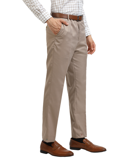 Model wearing Clarke Gable's Light Beige Sharp Fit Trousers in a casual setting