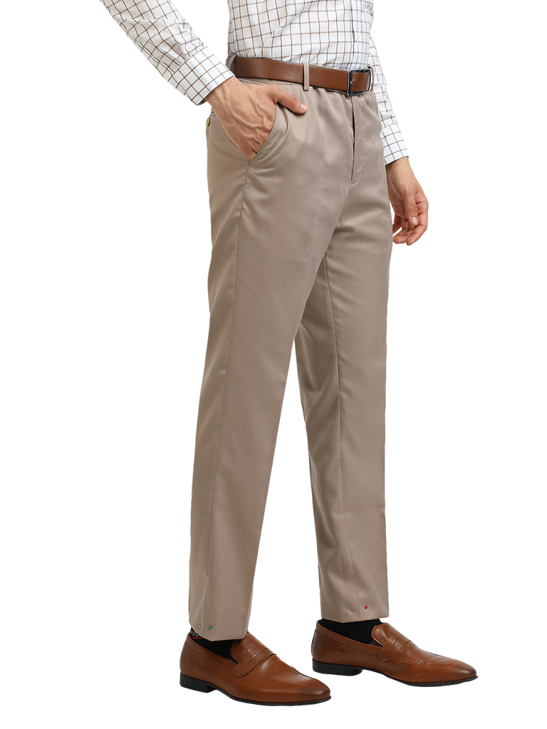 Model wearing Clarke Gable's Light Beige Sharp Fit Trousers in a casual setting