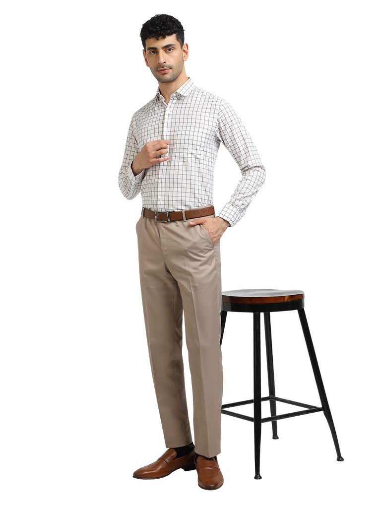 Model wearing Clarke Gable's Light Beige Sharp Fit Trousers in a casual setting