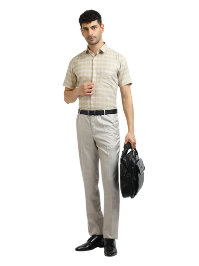 Model wearing Clarke Gable's Light Beige With White Checked Formal Shirt in a casual setting
