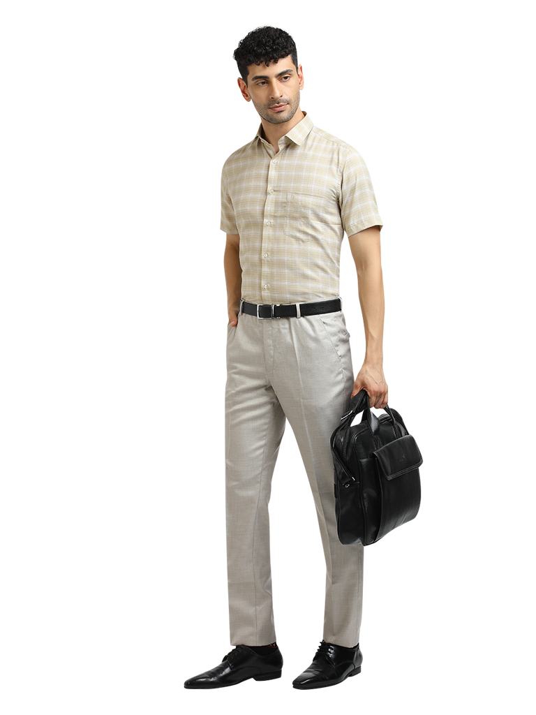 Model wearing Clarke Gable's Light Beige With White Checked Formal Shirt in a casual setting