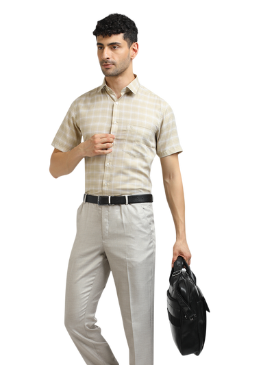 Model wearing Clarke Gable's Light Beige With White Checked Formal Shirt in a casual setting