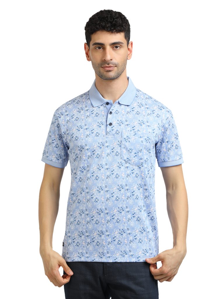 Model wearing Clarke Gable's Light Blue Printed Polo Collar T-Shirt in a casual setting