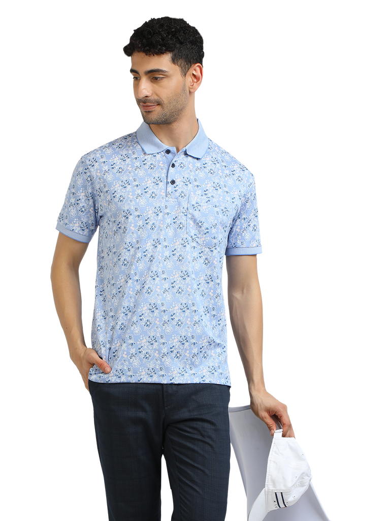 Model wearing Clarke Gable's Light Blue Printed Polo Collar T-Shirt in a casual setting