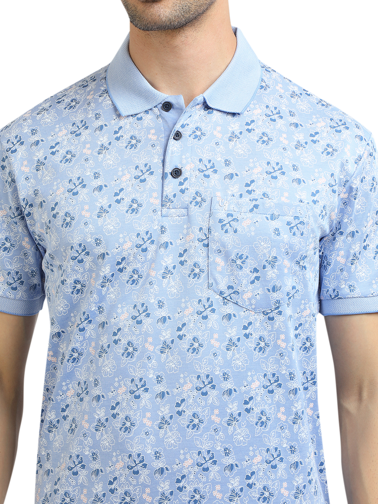 Model wearing Clarke Gable's Light Blue Printed Polo Collar T-Shirt in a casual setting