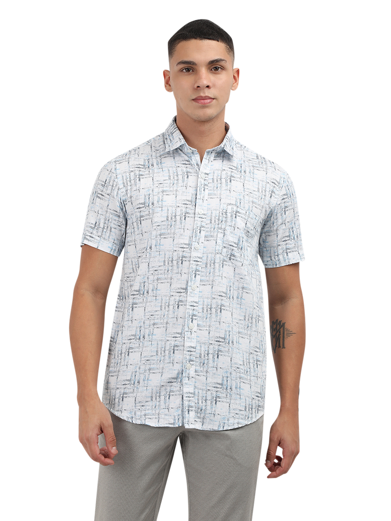 Model wearing Clarke Gable's Light Blue Printed Semi Casual Shirt in a casual setting