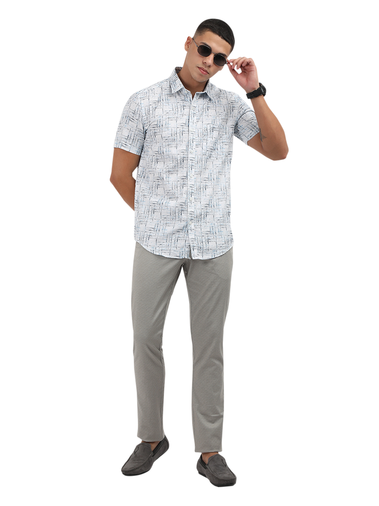 Model wearing Clarke Gable's Light Blue Printed Semi Casual Shirt in a casual setting