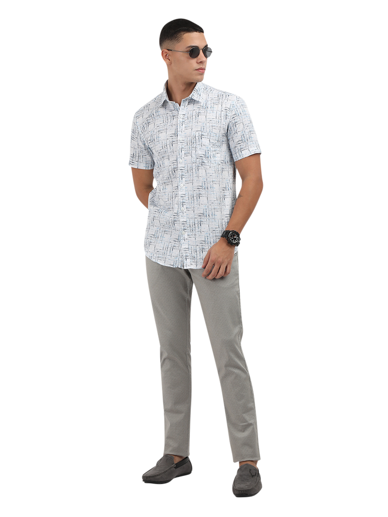 Model wearing Clarke Gable's Light Blue Printed Semi Casual Shirt in a casual setting