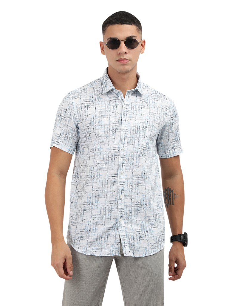 Model wearing Clarke Gable's Light Blue Printed Semi Casual Shirt in a casual setting