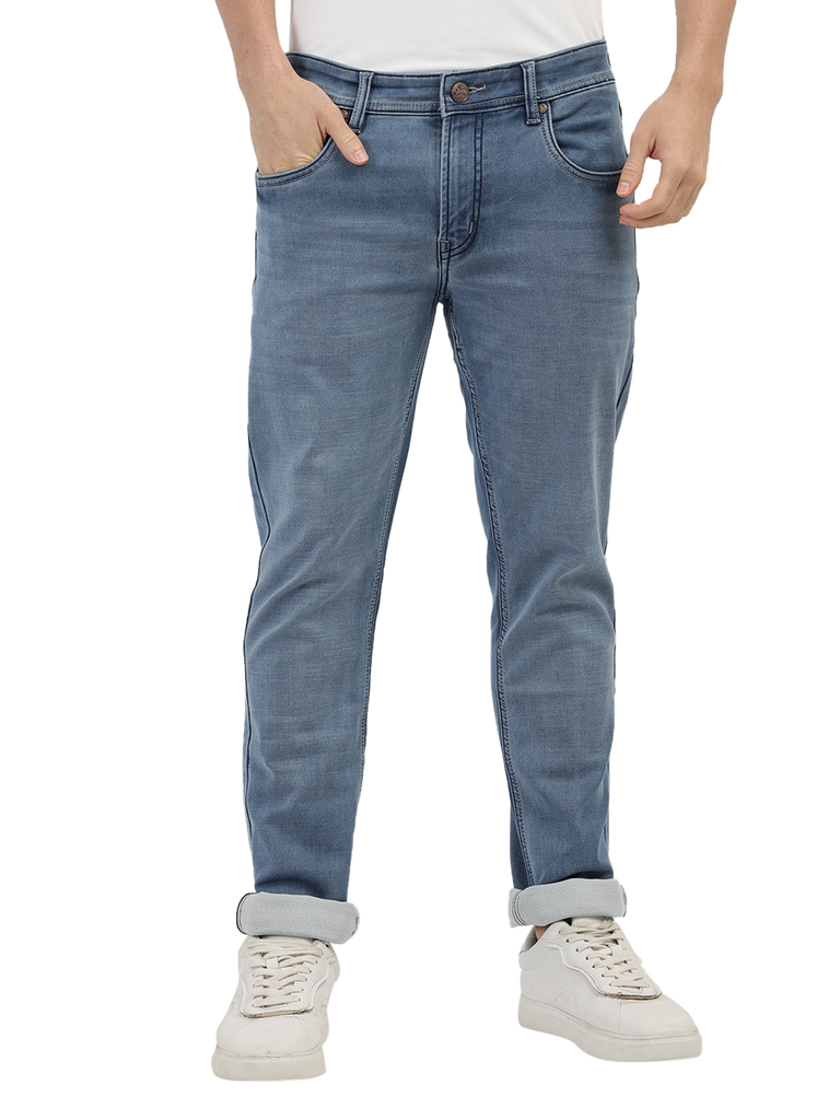 Model wearing Clarke Gable's Light Blue Skinny Fit Jeans in a casual setting