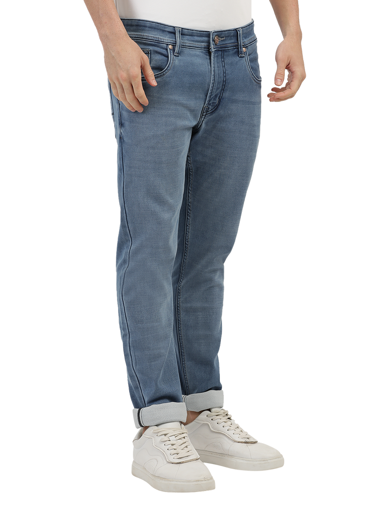 Model wearing Clarke Gable's Light Blue Skinny Fit Jeans in a casual setting