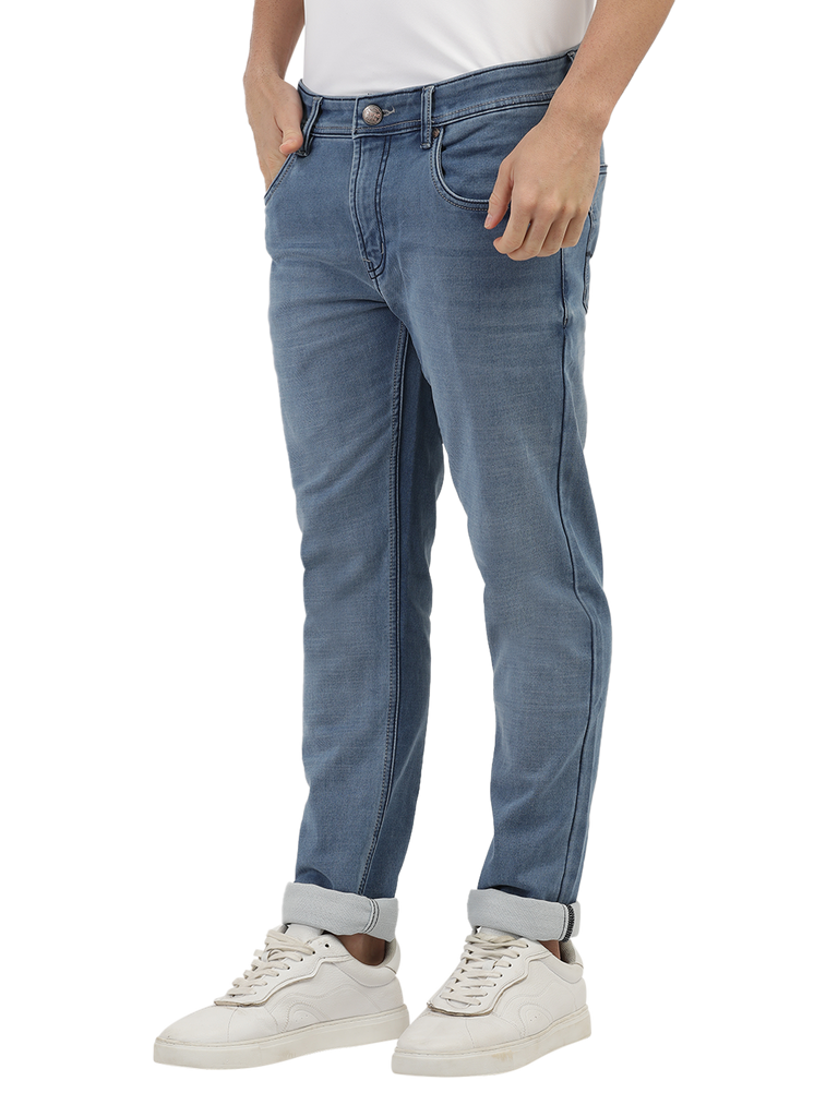 Model wearing Clarke Gable's Light Blue Skinny Fit Jeans in a casual setting