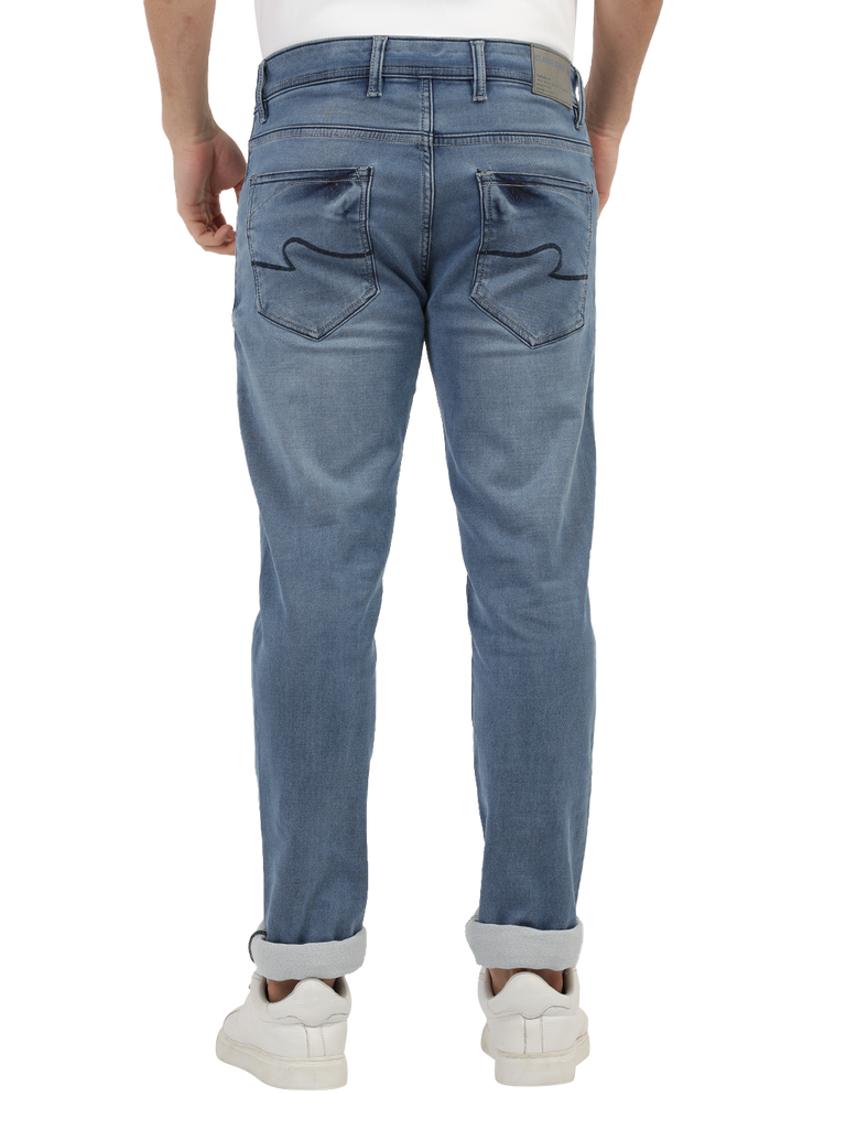 Model wearing Clarke Gable's Light Blue Skinny Fit Jeans in a casual setting