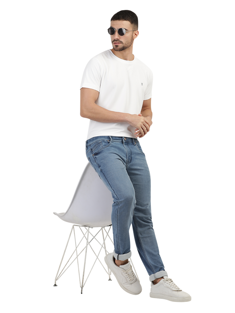 Model wearing Clarke Gable's Light Blue Skinny Fit Jeans in a casual setting