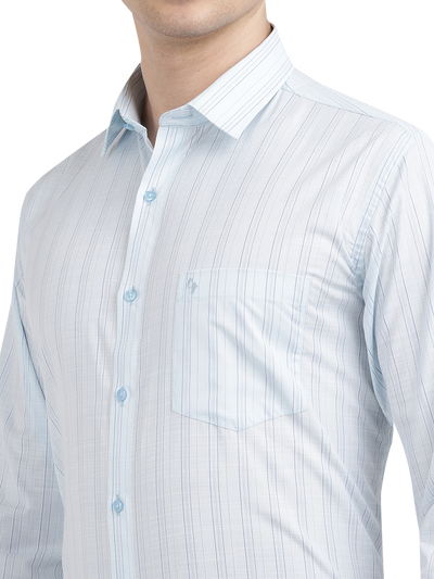 Model wearing Clarke Gable's Light Blue Striped Formal Shirt in a casual setting