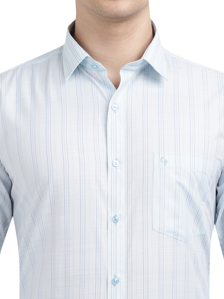 Model wearing Clarke Gable's Light Blue Striped Formal Shirt in a casual setting