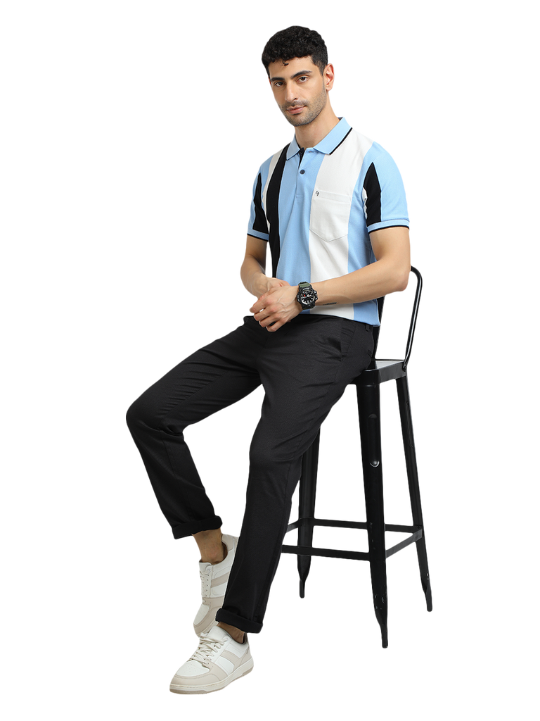 Model wearing Clarke Gable's Light Blue Striped Polo Collar T-Shirt in a casual setting