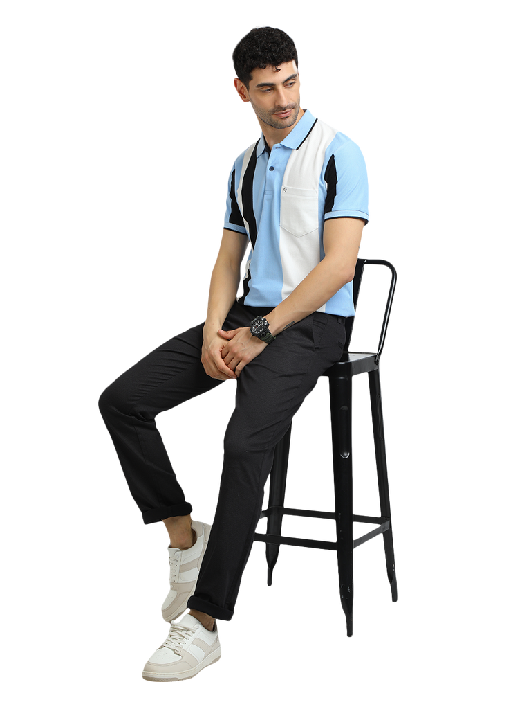 Model wearing Clarke Gable's Light Blue Striped Polo Collar T-Shirt in a casual setting