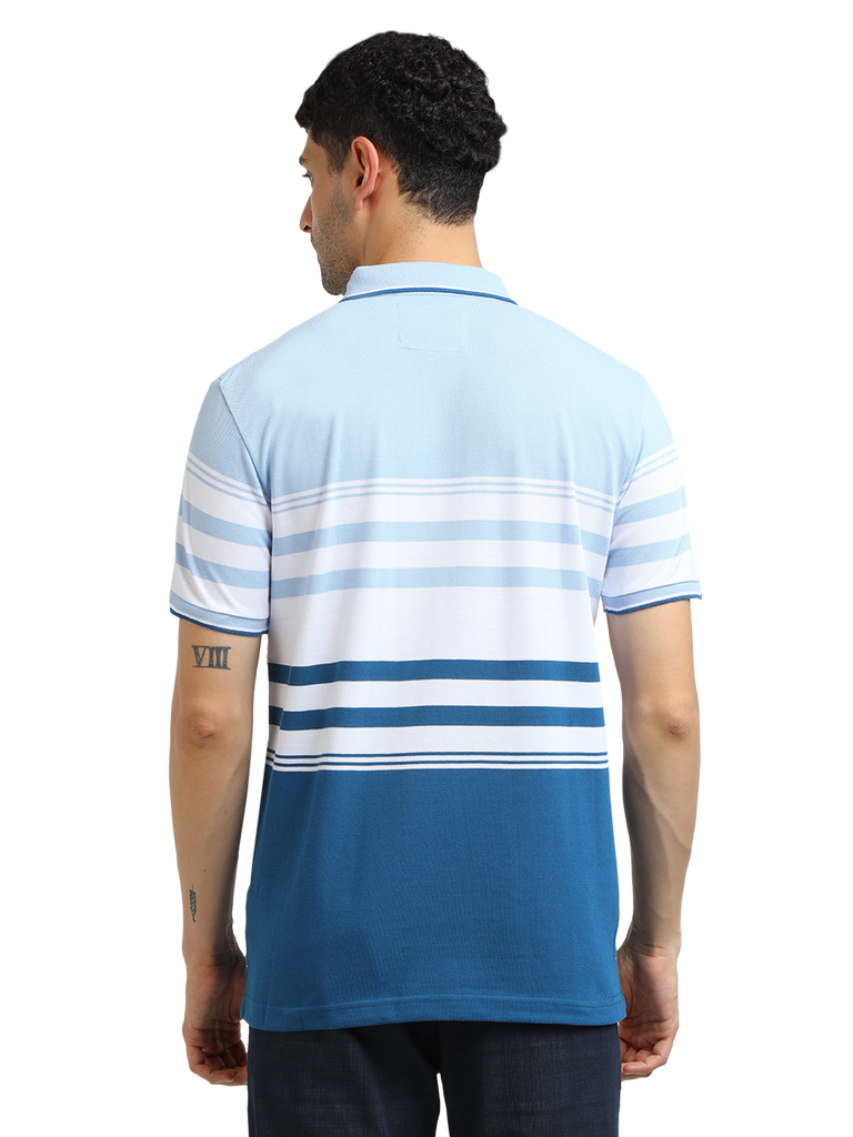 Model wearing Clarke Gable's Light Blue With White Striped Polo Collar T-Shirt in a casual setting