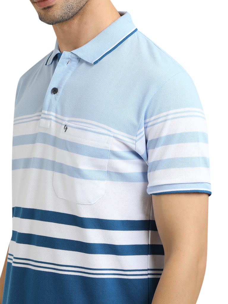 Model wearing Clarke Gable's Light Blue With White Striped Polo Collar T-Shirt in a casual setting