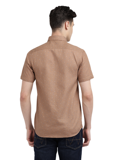 Model wearing Clarke Gable's Light Brown Printed Casual Shirt in a casual setting