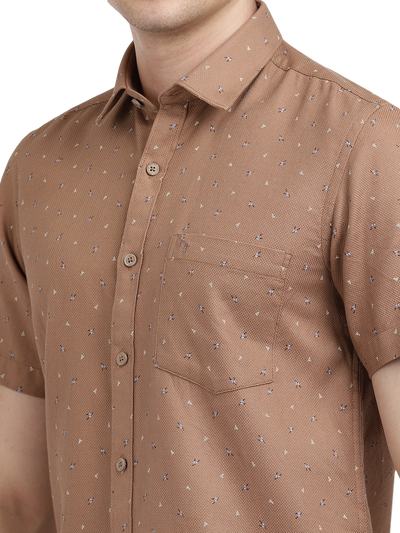Model wearing Clarke Gable's Light Brown Printed Casual Shirt in a casual setting