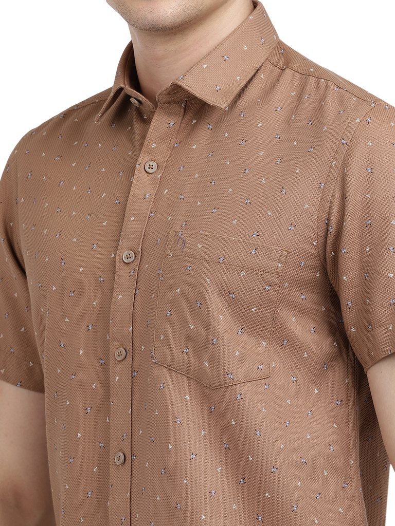 Model wearing Clarke Gable's Light Brown Printed Casual Shirt in a casual setting