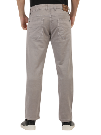 Model wearing Clarke Gable's Light Brown Tinted Skinny Fit Jeans in a casual setting