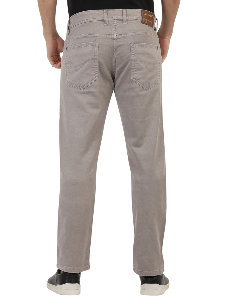 Model wearing Clarke Gable's Light Brown Tinted Skinny Fit Jeans in a casual setting