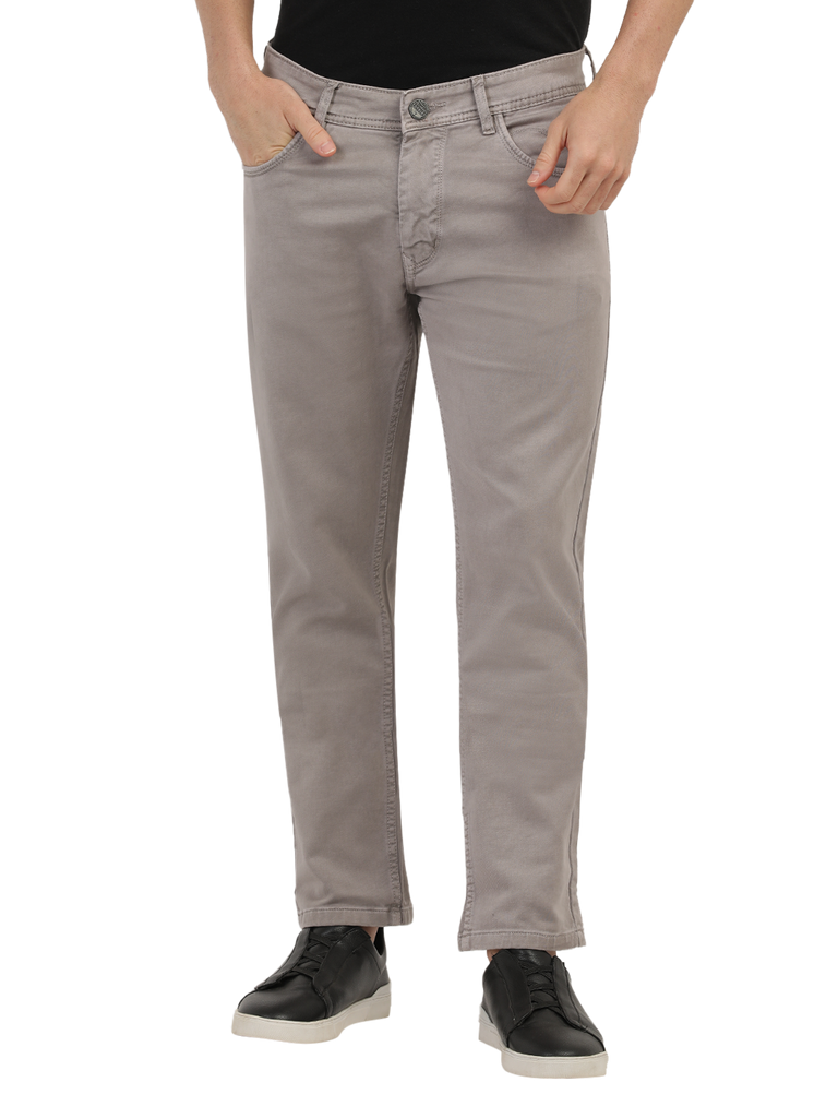 Model wearing Clarke Gable's Light Brown Tinted Skinny Fit Jeans in a casual setting