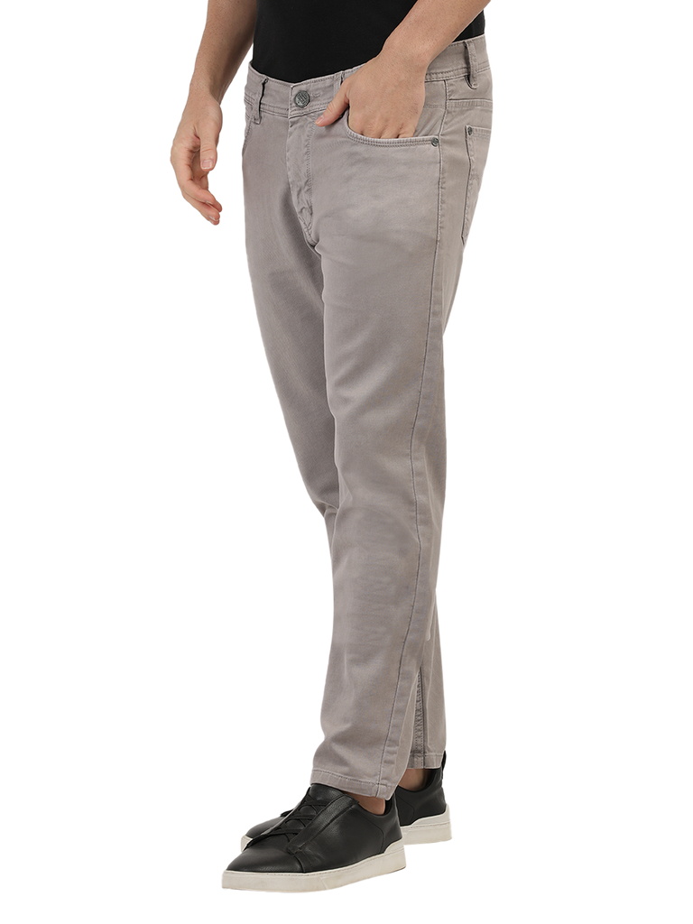 Model wearing Clarke Gable's Light Brown Tinted Skinny Fit Jeans in a casual setting